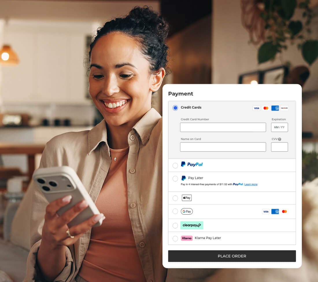 A smiling woman holding a smartphone that displays a "Fastlane by PayPal" checkout screen. A verification overlay is visible on the phone screen with the text "Let's confirm it's you" and a six-digit confirmation code "157143" being entered into boxes.